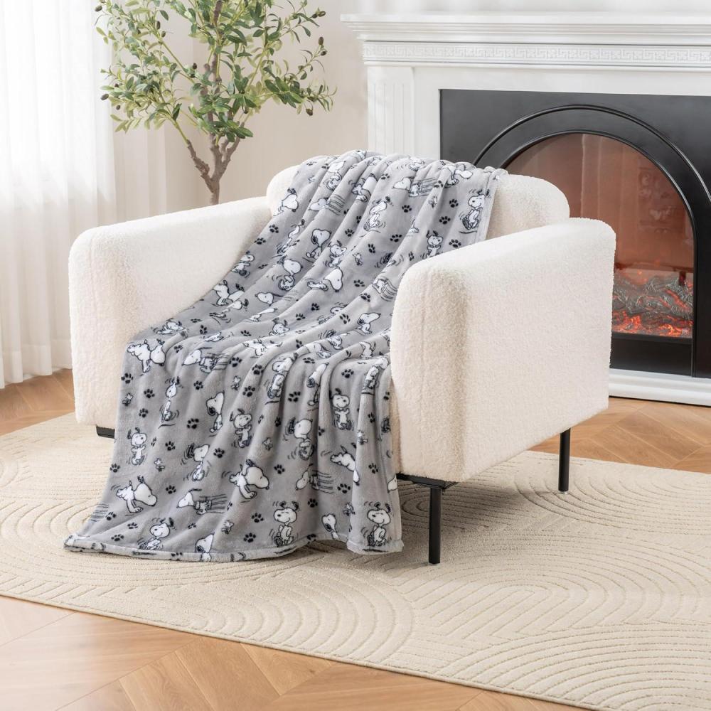 image:imageBerkshire Blanket Peanuts VelvetLoft Cute Character Snoopy Plush Throw BlanketPeanuts Snoopy Make A Wish Spring PinkThrow 55 in x 70 in Official Peanuts ProductPeanuts Poses and Paws Grey