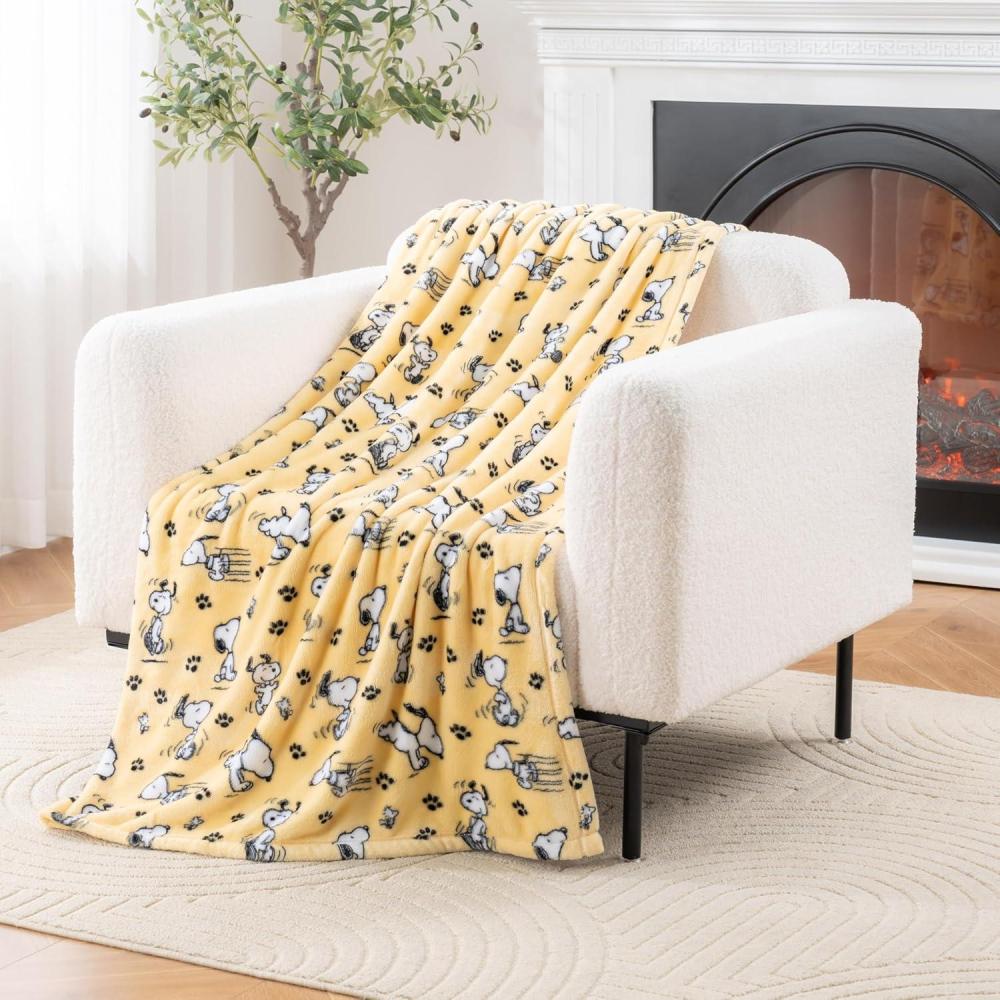 image:imageBerkshire Blanket Peanuts VelvetLoft Cute Character Snoopy Plush Throw BlanketPeanuts Snoopy Make A Wish Spring PinkThrow 55 in x 70 in Official Peanuts ProductPeanuts Poses and Paws Sundress