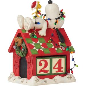 Enesco Peanuts by Jim Shore Snoopy’s Dog House Christmas Countdown Calendar Figurine- Stone Resin Hand Crafted Painted Collectible Peanuts Snoopy Figurines Christmas Home Decor Statue, 7.09 Inch